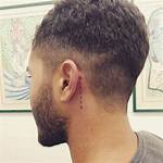Uncover Captivating Men's Behind-the-Ear Tattoo Ideas
